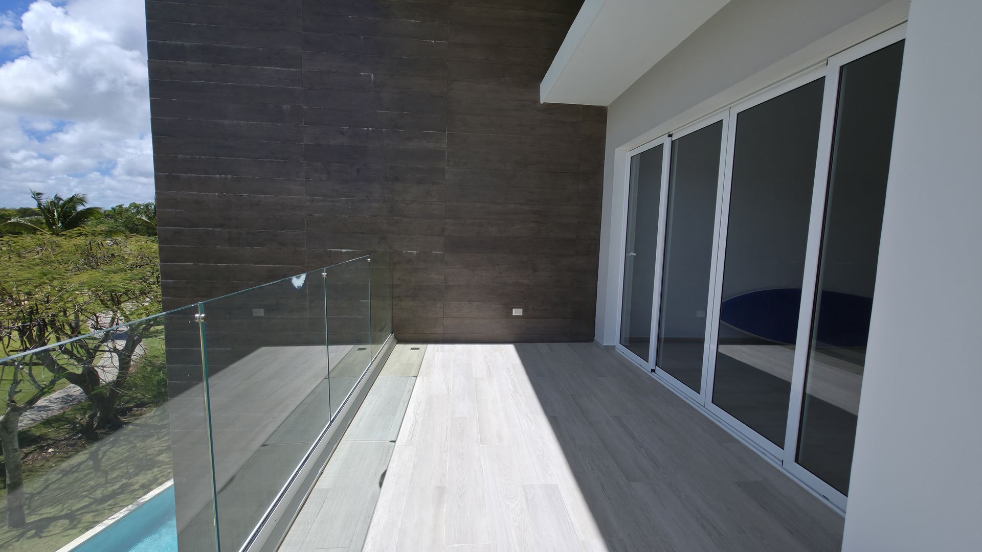 Balcony view of pool and grounds