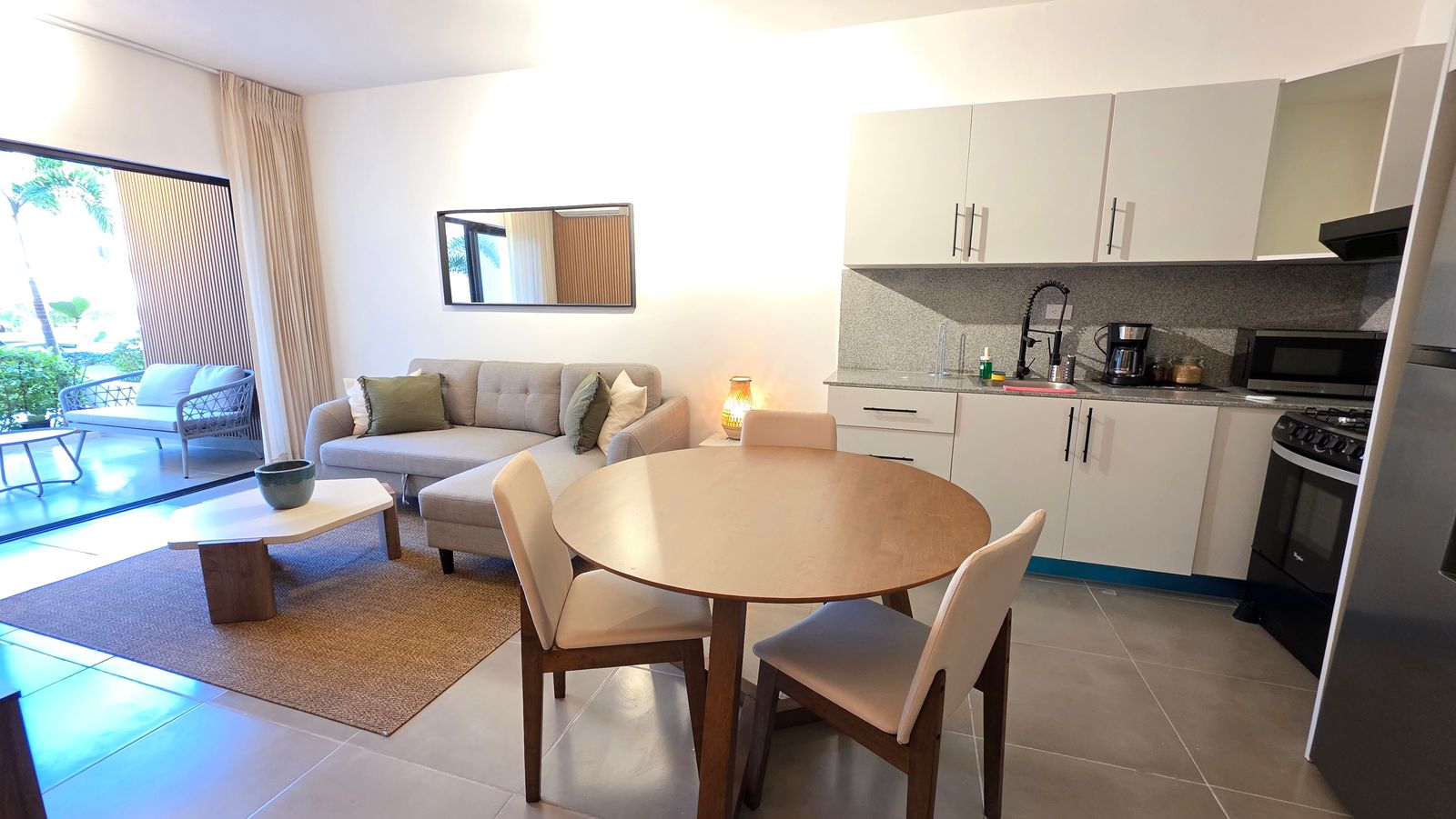 Open-concept living room, dining and kitchen