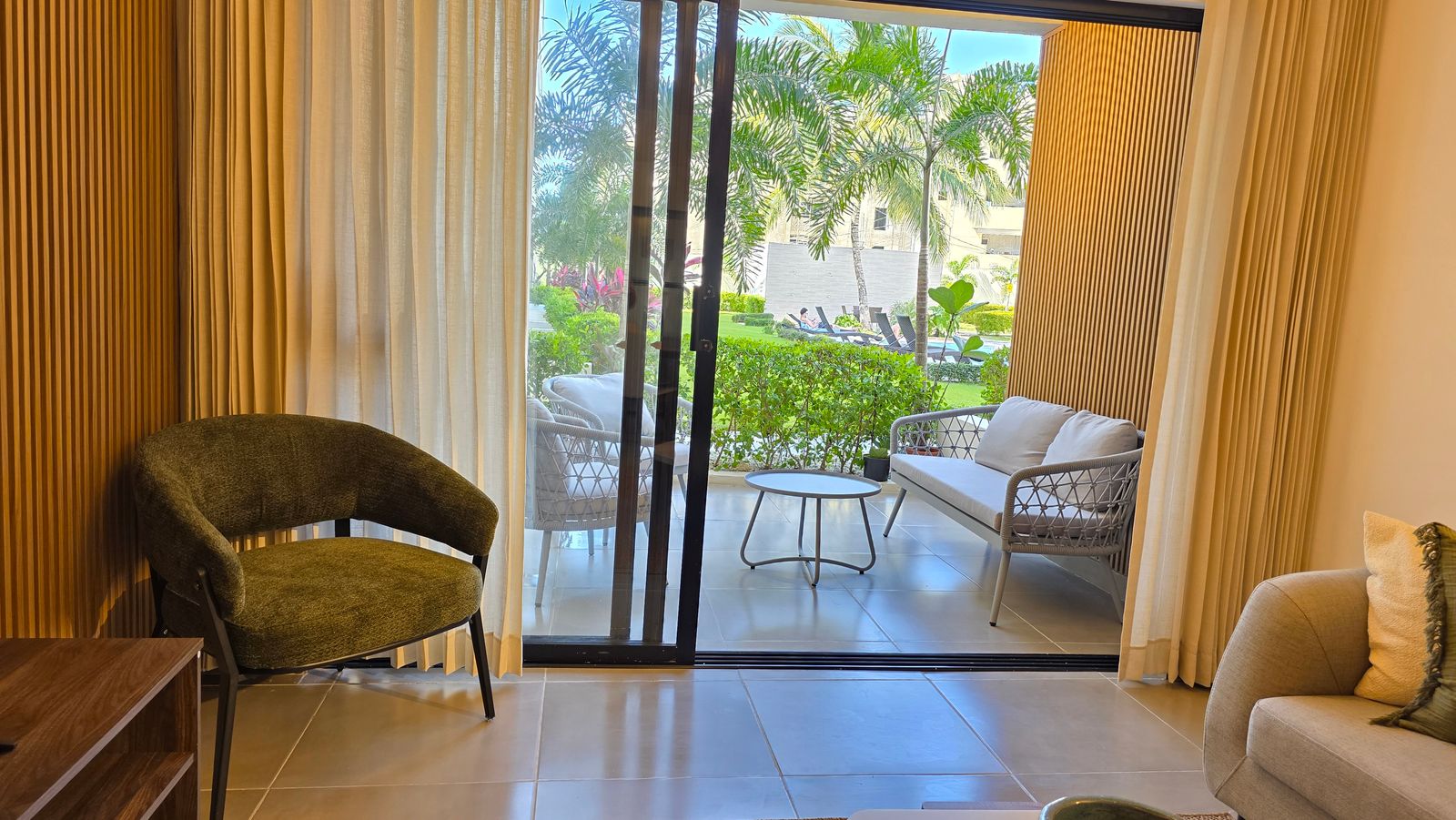 View from living room to terrace and gardens