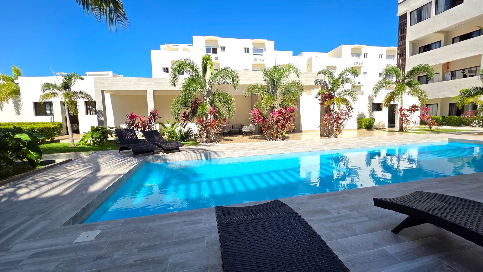 Resort-style pool at Los Corales apartment complex