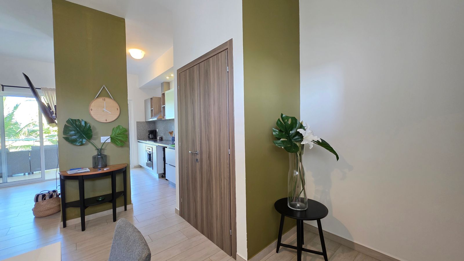 Entry hallway with green accent wall