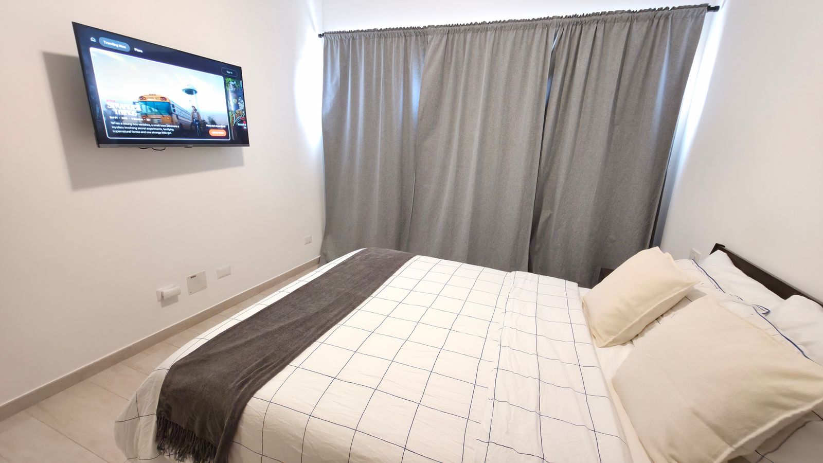 Second bedroom with quality linens and decor